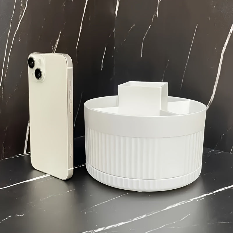 A White Rotating Cosmetic Organizer with Five Compartments, Designed for 360° Access, Perfect for Organizing And Displaying Items on Dressing Tables in Various Settings Like Bathrooms, Bedrooms, And Sinks