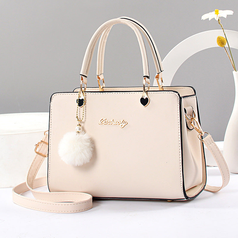 Elegant Faux Leather Handbag with Tassel